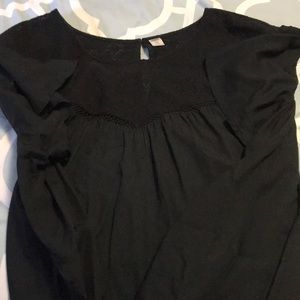 Black light weight dress with lace-like detail